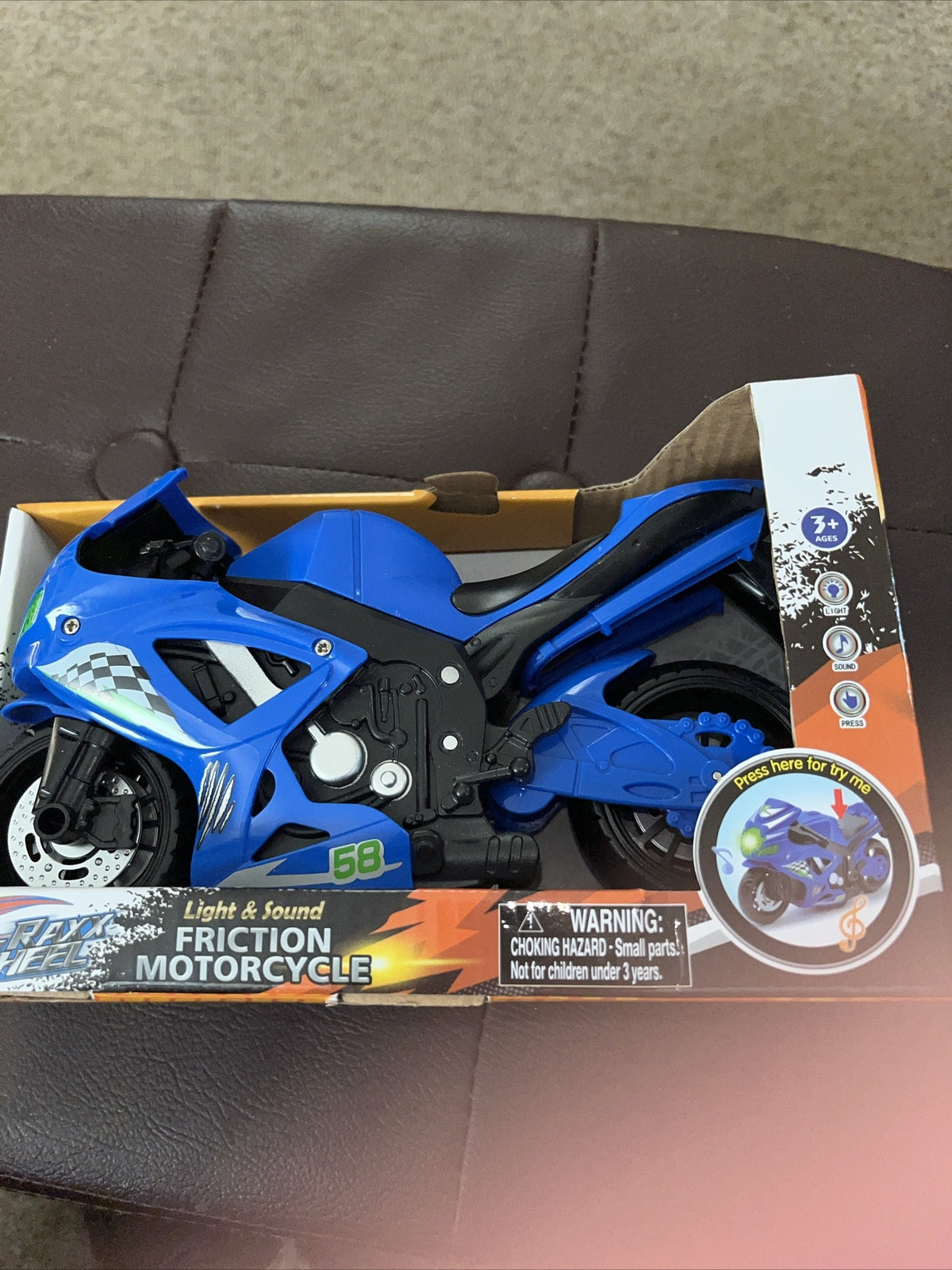 Friction-Powered Motorcycle Toy with Light and Sound Features