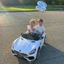 12V 7AH Ride-On 2-Seater Power Wheels Car with Remote, Bluetooth, LED Lights, and MP3 Player Magic Cars 1