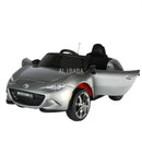 12V Licensed Mazda MX-5 RF Kids Ride-On Toy with Parental Remote, Music, and Suspension System Magic Cars 11