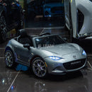 12V Licensed Mazda MX-5 RF Kids Ride-On Toy with Parental Remote, Music, and Suspension System Magic Cars 3
