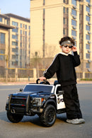 12V Black Remote Control Ride-On Car with 4-Wheel Shock Absorption for Kids Aged 3-6