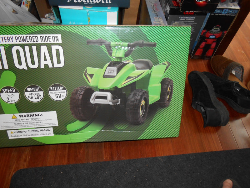 6V Battery-Powered Mini Ride-On Quad for Kids 3+ with 66 lbs Weight Capacity Magic Cars 2