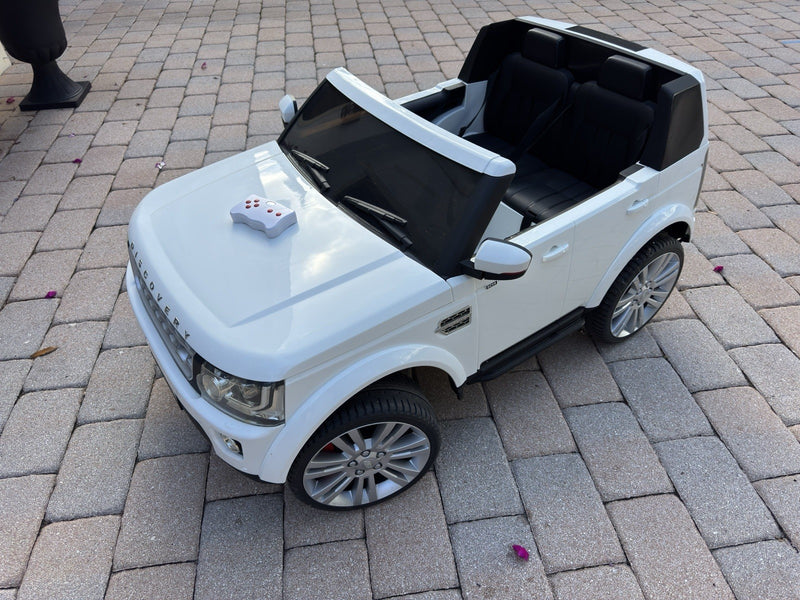 Land Rover Licensed Electric Ride-On Car with Music, Rechargeable Battery and Remote Control Magic Cars 0