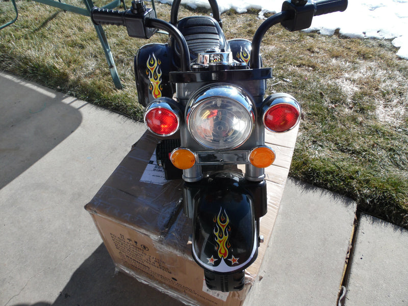 Black Battery-Powered Three-Wheel Ride-On Toy for Ages 2–5 Years Magic Cars 2