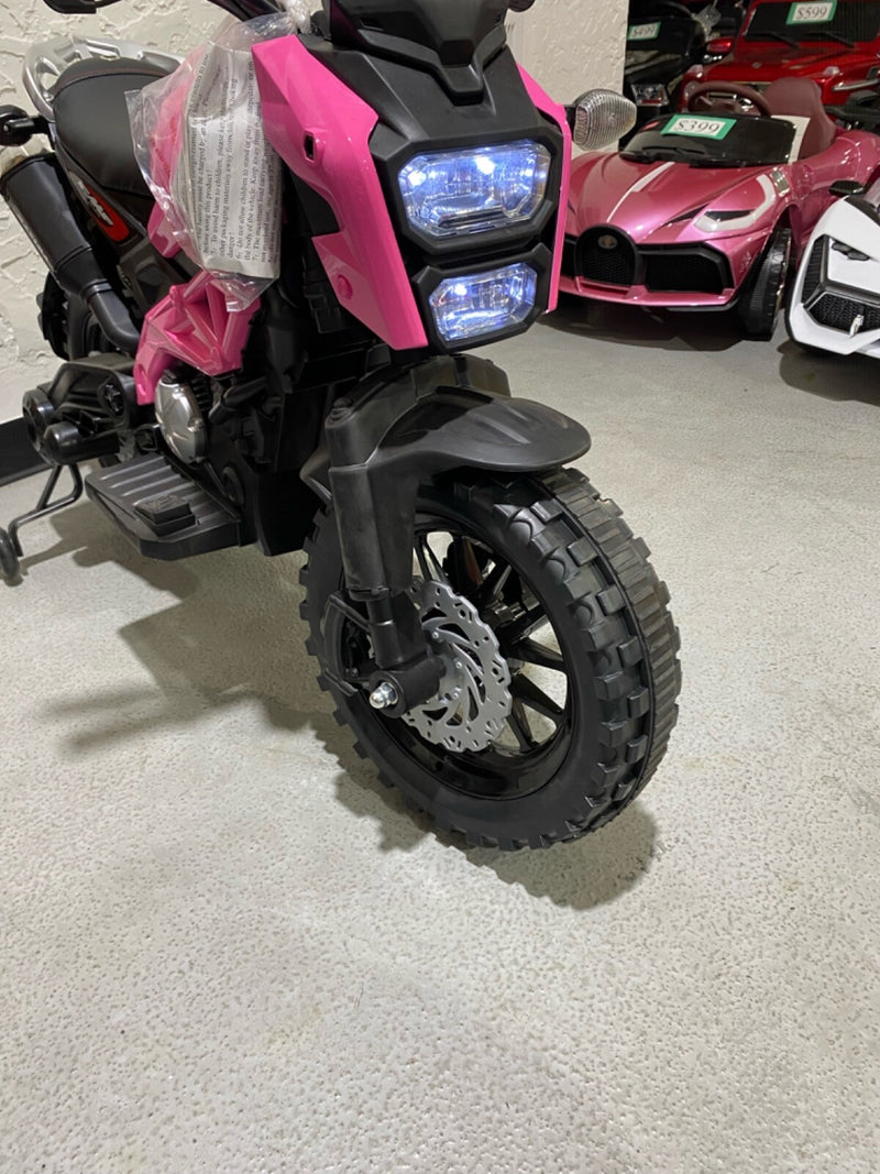 Ride-On Motorcycle with Training Wheels and Built-in Music System Magic Cars 2