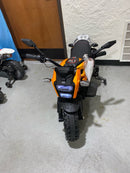 Ride-On Motorcycle with Training Wheels and Built-in Music System Magic Cars 4