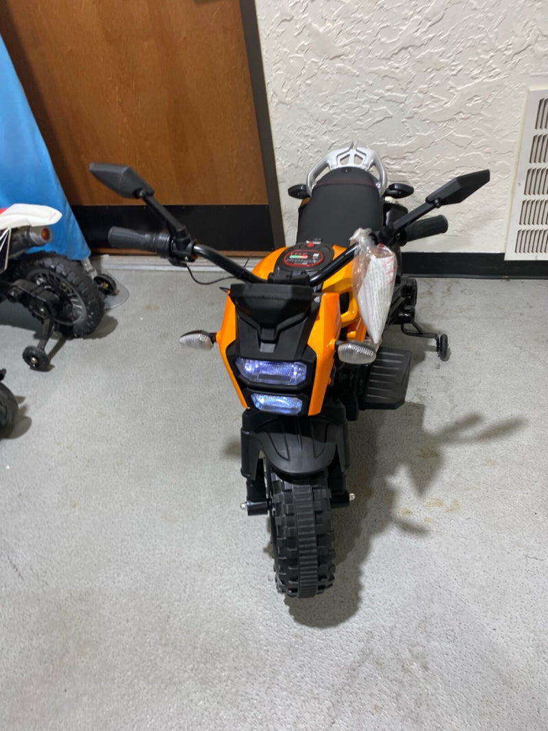 Ride-On Motorcycle with Training Wheels and Built-in Music System Magic Cars 4