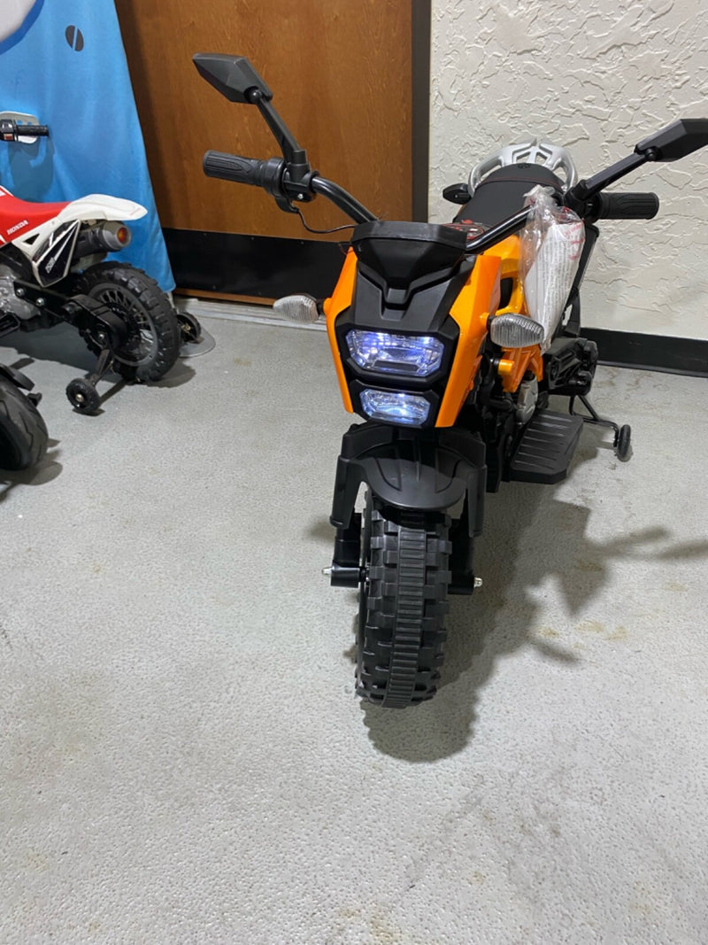 Ride-On Motorcycle with Training Wheels and Built-in Music System Magic Cars 5