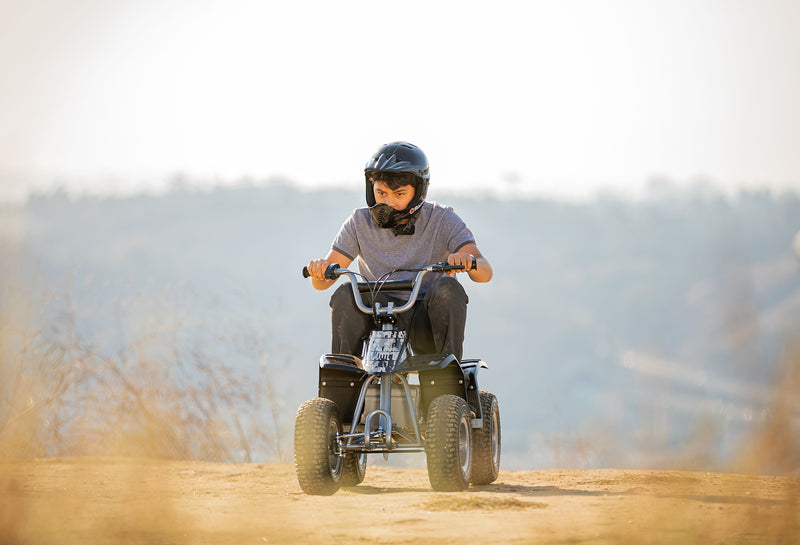 24V Powered Dirt Quad Ride-On with 12" Knobby Tires, Up to 8 MPH for Kids 8+ Magic Cars 1