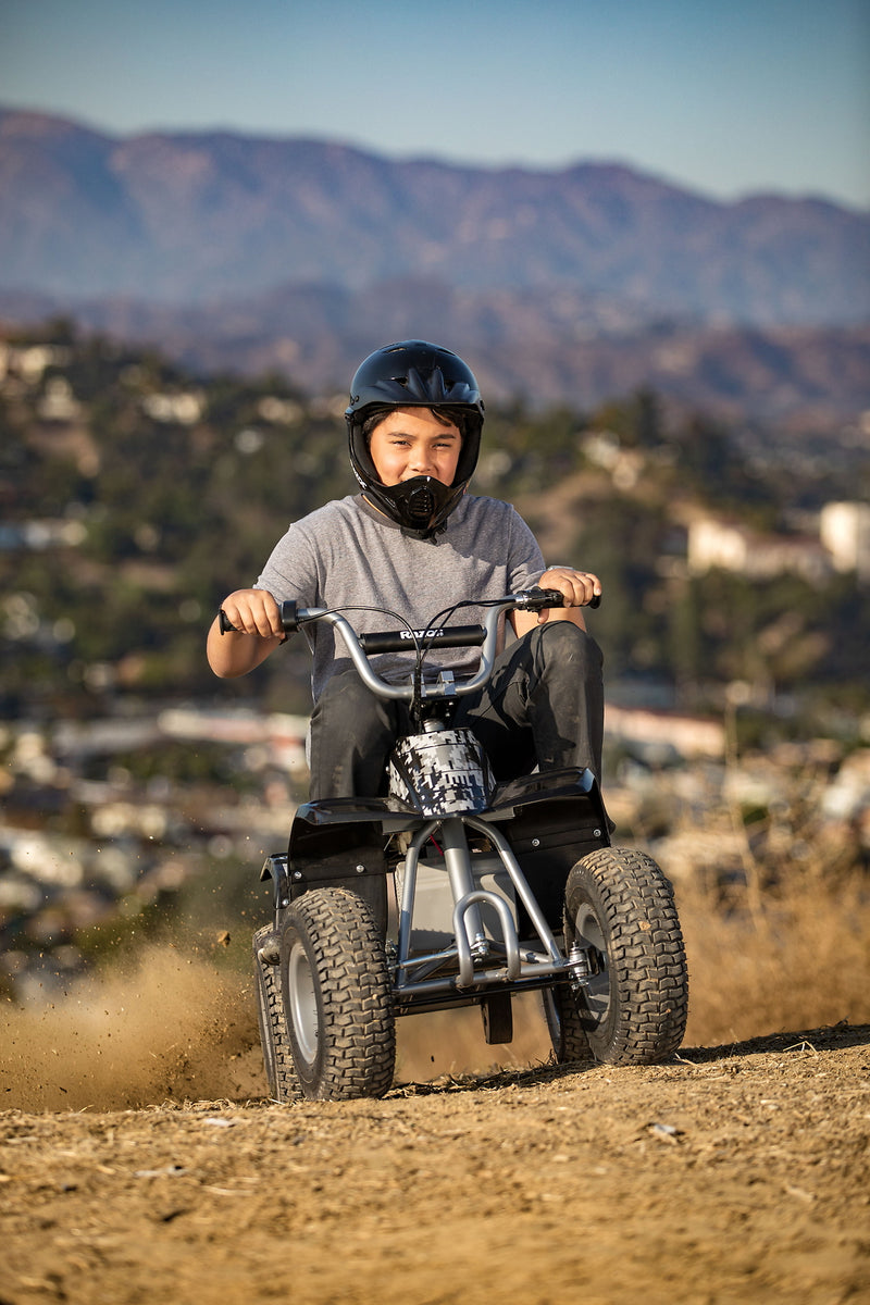 24V Powered Dirt Quad Ride-On with 12" Knobby Tires, Up to 8 MPH for Kids 8+ Magic Cars 4