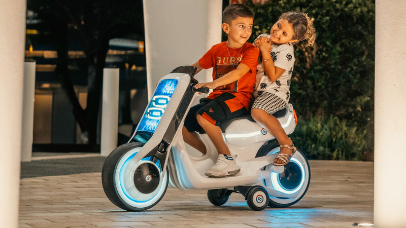 Electric Ride-On Kids Motorcycle Scooter with LED Lights and 2-Seater Design Magic Cars 2