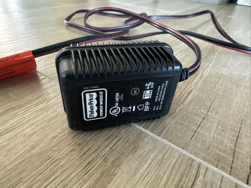 Model 00801-1778 Power Wheels with Battery, Charger, and AC Adapter Magic Cars 1