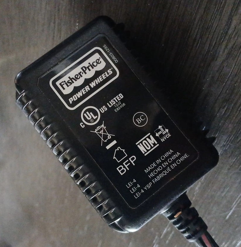 Model 00801-1778 Power Wheels with Battery, Charger, and AC Power Adapter Magic Cars Variant 0