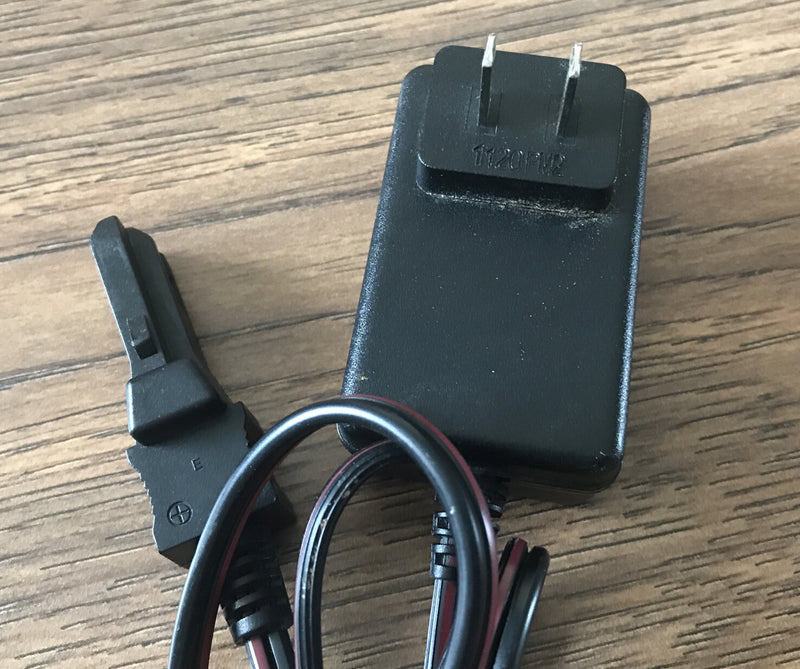 12V Battery-Powered Ride-On Toy with Charger and Wheels Model 00801-1778 Magic Cars 2