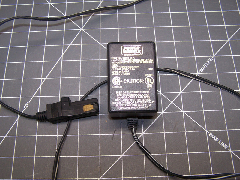 12V Power Wheels Class 2 Ride-On Toy with Battery and Charger Magic Cars 0