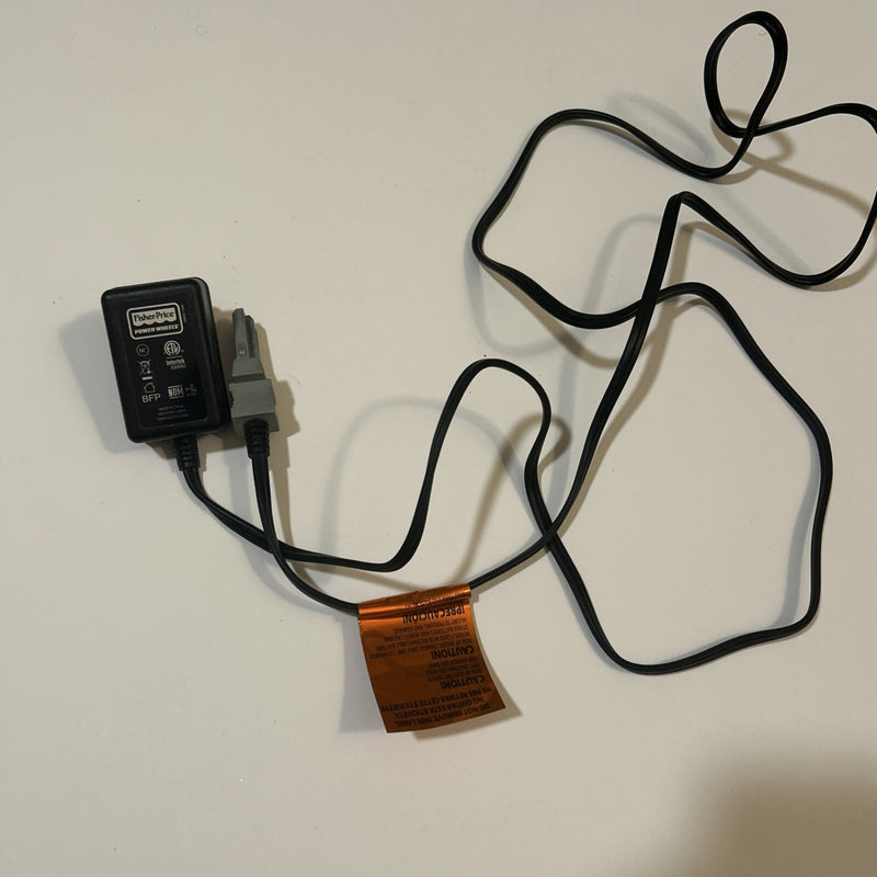 12-Volt Power Wheels with Battery and Charger Model 00803-1306 Magic Cars 1