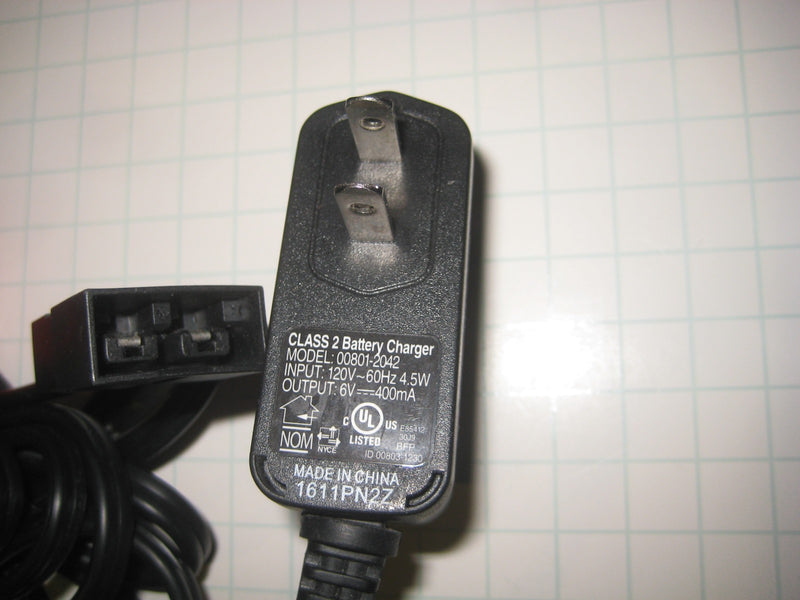 6 Volt Battery-Powered Ride-On Toy Car with Wheels and Charger Model 00801 2042 Magic Cars 1