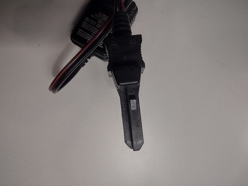 Power Wheel with Charger and Plug-In Cord, Used Magic Cars 2