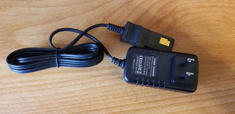 12V Ride-On Power Wheels Car with Battery and Charger, Gray with Orange Top Magic Cars 1