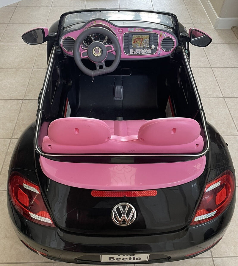 Kids Trax Pacific Cycle Black and Pink 2-Seat Volkswagen Beetle Electric Ride-On Car Magic Cars 1
