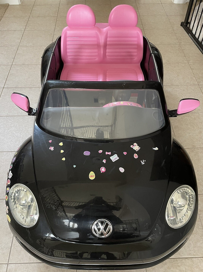 Kids Trax Pacific Cycle Black and Pink 2-Seat Volkswagen Beetle Electric Ride-On Car Magic Cars Variant 0