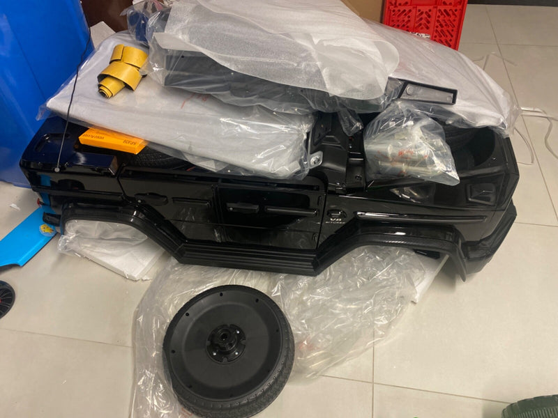 Electric 2-Seater Kids Car G-Class SUV Style Magic Cars 9