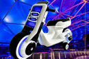 Electric Kids Ride-On Scooter Motorcycle Toy with LED Lights and Music, Tron-Inspired Design Magic Cars 12