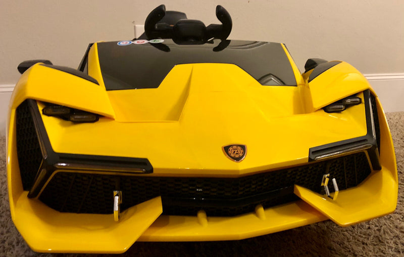 12V Battery-Powered Kids Ride-On Car with Remote Control Yellow Magic Cars 0