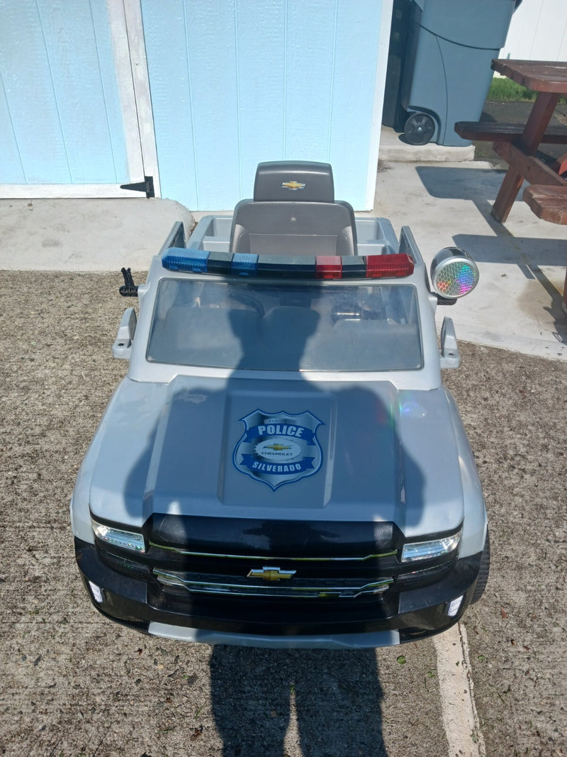 Kids Ride-On Chevy Police Truck with Charger Magic Cars 0