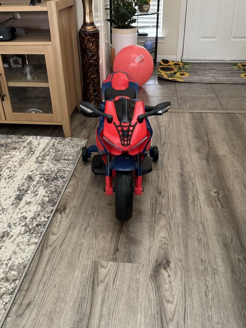 Kids Spider-Man 6V Battery-Powered Ride-On Motorcycle with Working Headlights for Ages 3+ Magic Cars 1