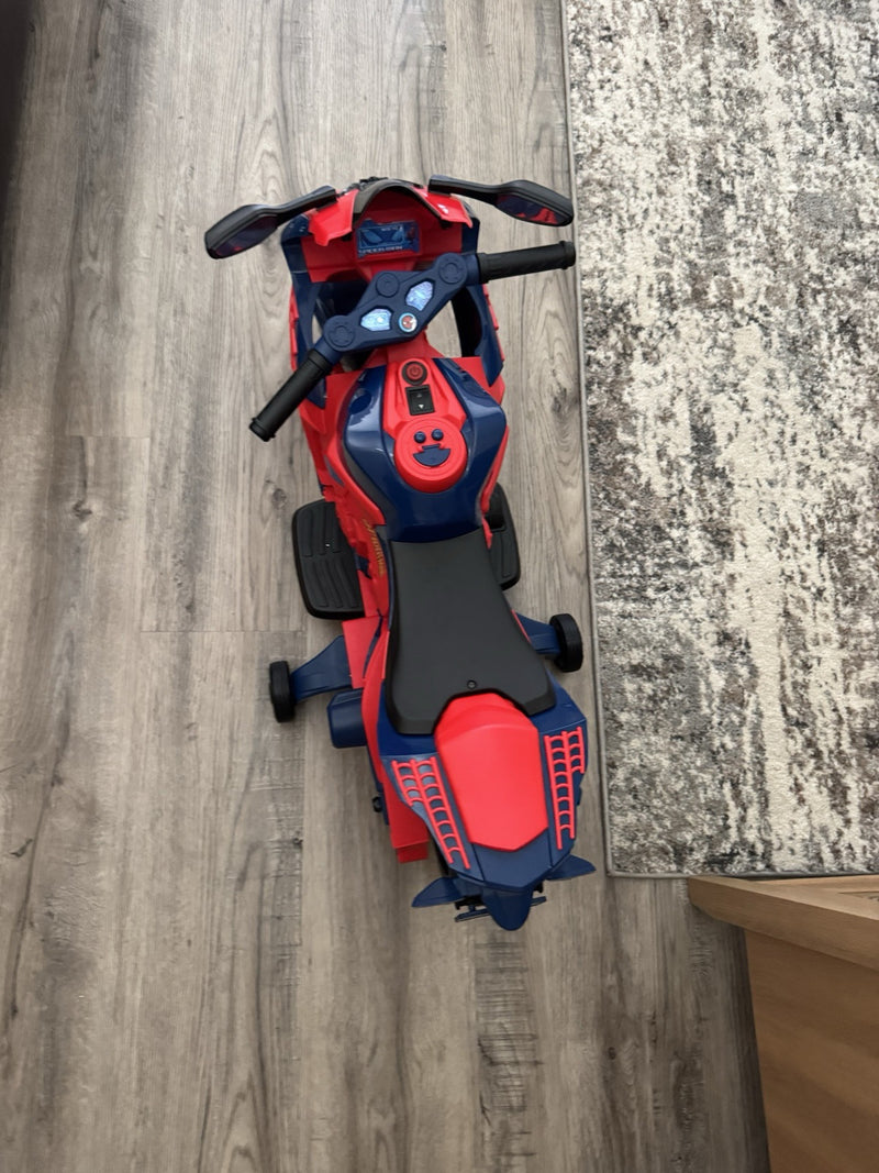 Kids Spider-Man 6V Battery-Powered Ride-On Motorcycle with Working Headlights for Ages 3+ Magic Cars 2
