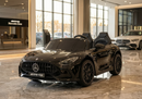 Licensed Mercedes-AMG GT 63 Ride On Car for Kids, 2 Seater 24V 4x4 with Rubber Tires W/Magic Cars® Wireless Parental Control - Black