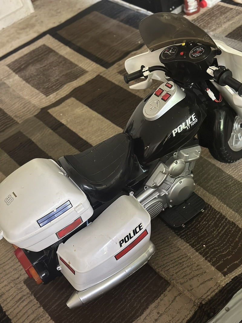 12V Battery-Powered Kids Police Motorcycle with Music Magic Cars 1