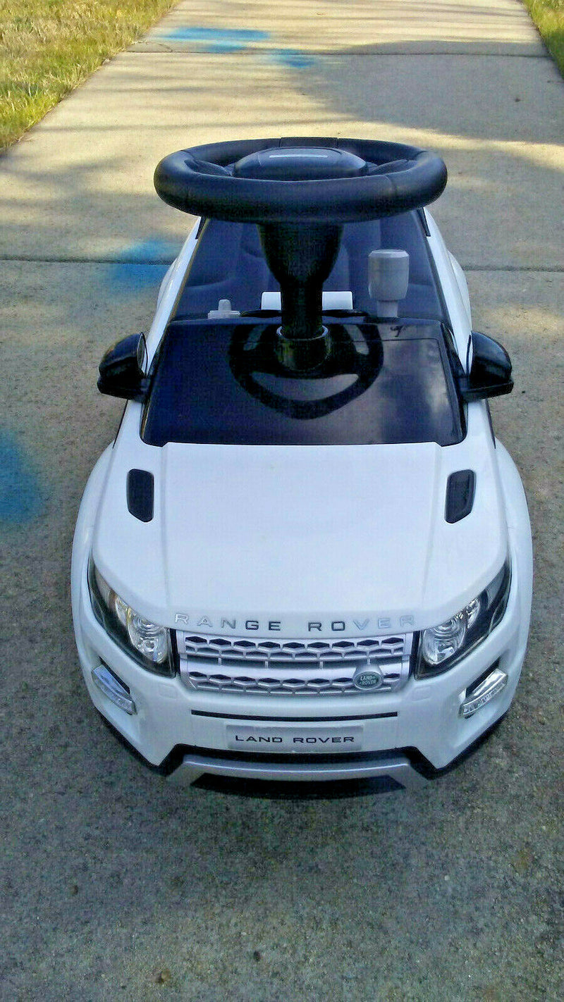 Land Rover Evoque Ride-On Push Car with Music Jeep 28.5-Inch Long Magic Cars Variant 0