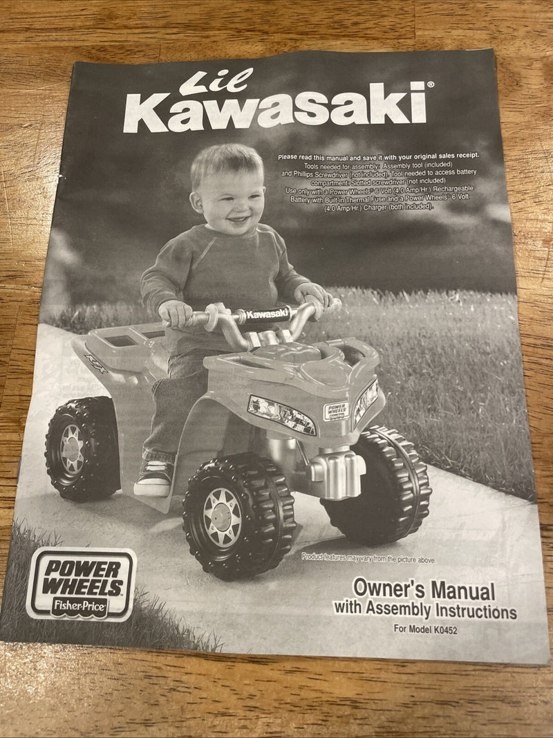Compact Kawasaki Owner’s Manual for Power Wheels Magic Cars 0