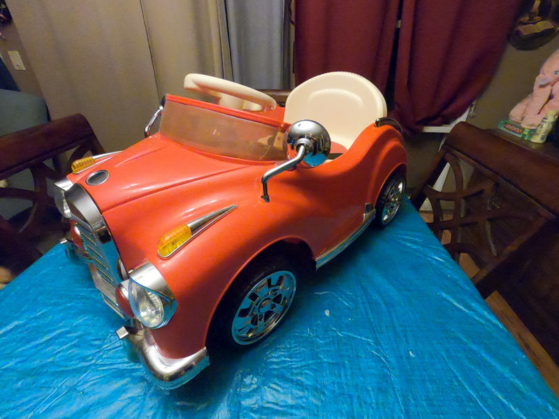 Red Battery-Powered Classic Ride-On Lil Rider Car Vehicle Magic Cars 2