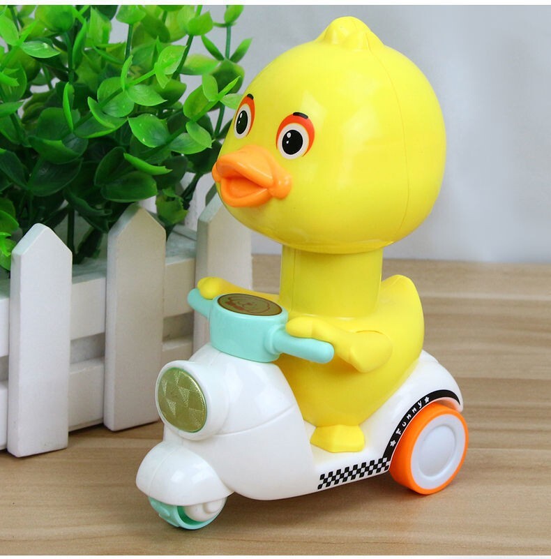 Manual Pressing Head-Free Rotation Cute Duck Press Car Motorcycle Toy Magic Cars 9