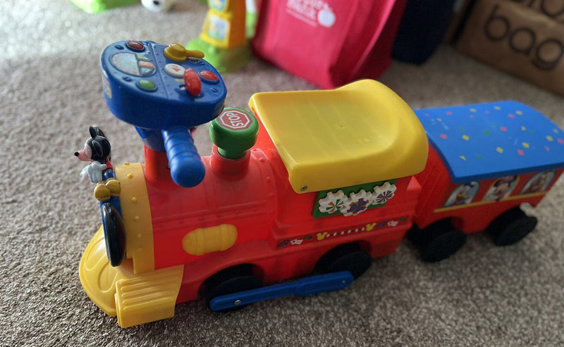 Battery-Powered Kids Ride-On Train with Caboose and Tracks Magic Cars 1
