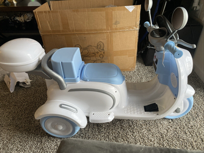 Motocicleta eléctrica para niños de 12 V con 2 asientos Magic Cars 1