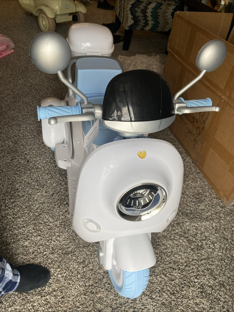 Motocicleta eléctrica para niños de 12 V con 2 asientos Magic Cars 2