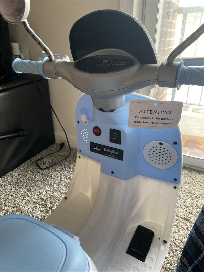 Motocicleta eléctrica para niños de 12 V con 2 asientos Magic Cars 4