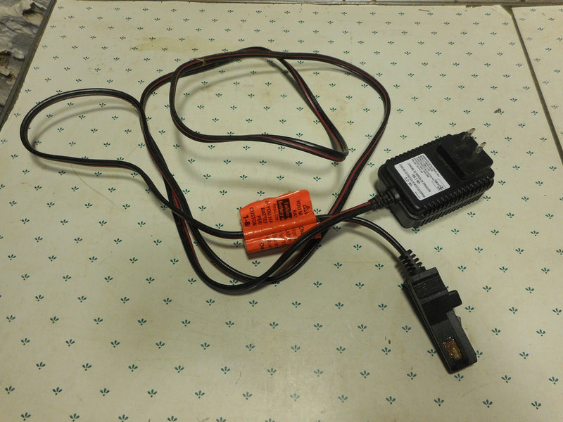 Grey Battery-Powered Wheels with AC/DC Adapter and Charger Cord Magic Cars Variant 0