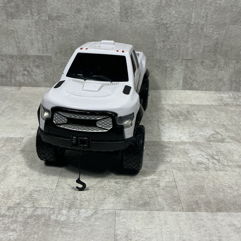 Kids 4x4 Off-Road Mud Truck with Working Winch and Sound Features, 13 in Long 6 in Tall Magic Cars 1