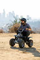 24V Electric Ride-On Dirt Quad with 12" Knobby Tires and 8 MPH Speed Magic Cars 4