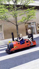 Kids Ride-On Train for Backyard Fun – Battery Powered W/Magic Cars® Remote Control, Real Steam Stack, MP3 & Working Caboose (Ages 1–10)