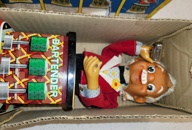 Battery-Operated Mechanical Tin Bartender Toy with Working Smoke and Dark Skin Design