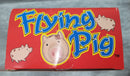 VINTAGE BATTERY-POWERED FLYING PIG TOY