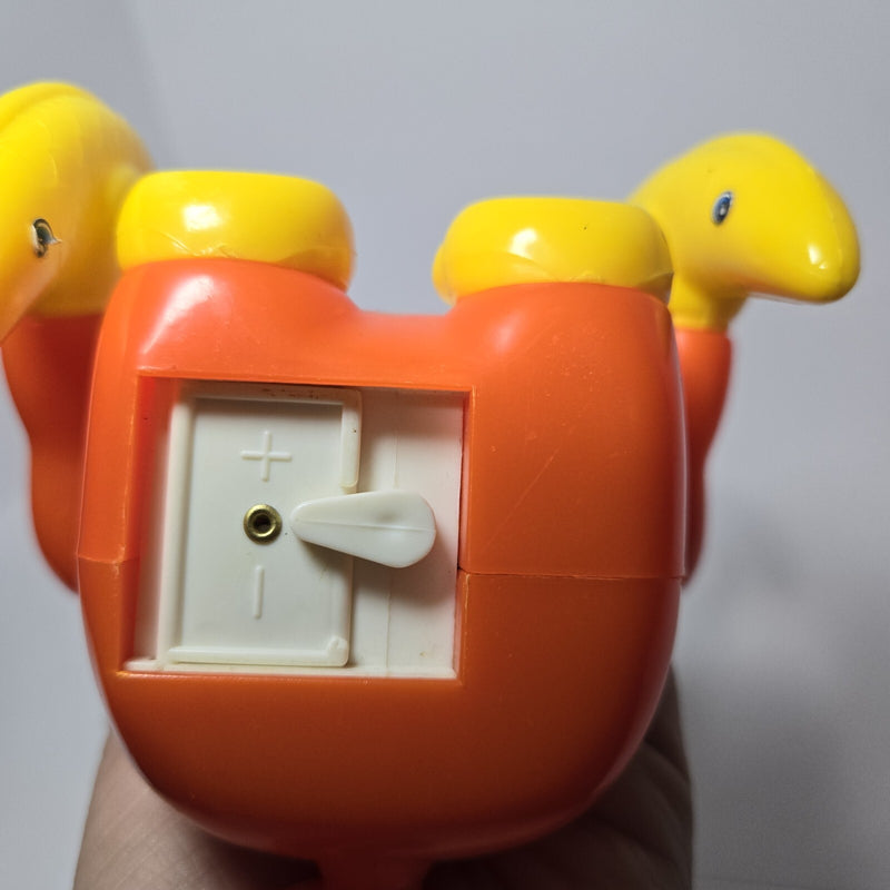 Animated Orange Monkey Toy with Yellow Hat Patent Pending
