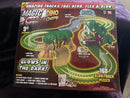 Dino Chomp 9ft Glow-in-the-Dark Speedway Track Set with 160 Pieces