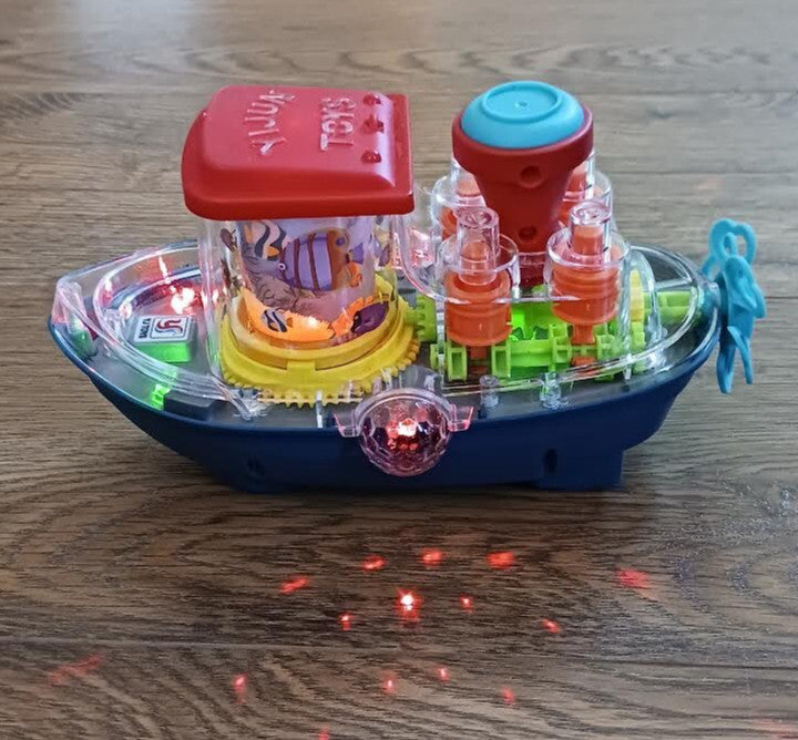 Plastic Bump N Go Tugboat Toy with Lights, Movement, and Music
